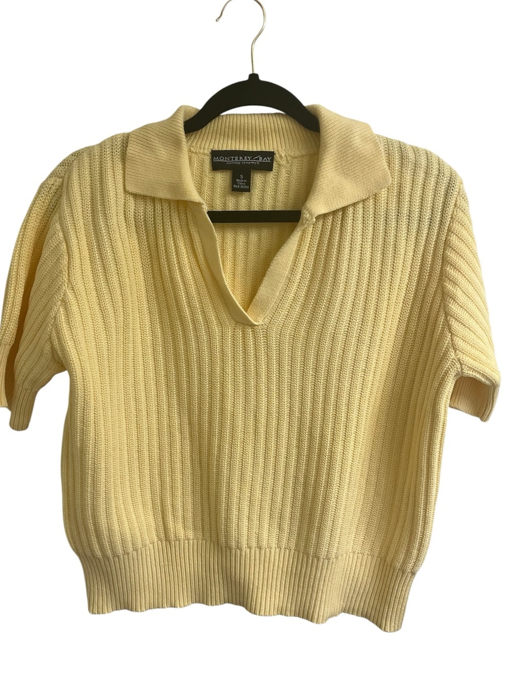Monterey Bay  polo sweater yellow color and a ribbed knit texture. Size S
